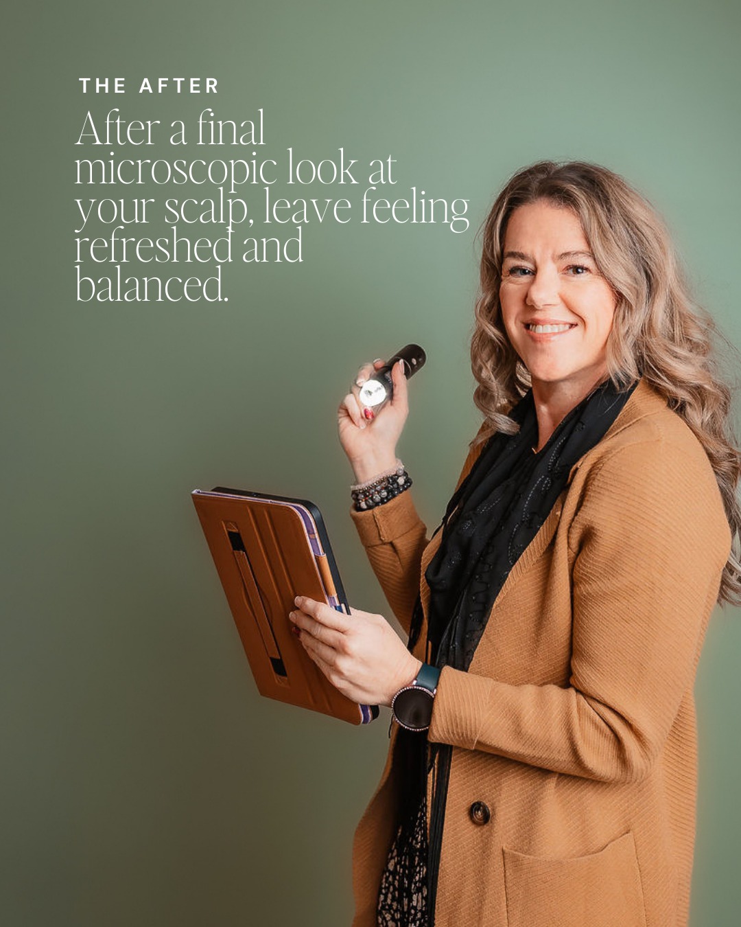 Solari Professional, Ashley, holding the dermascope and Ipad waiting to look at your scalp.